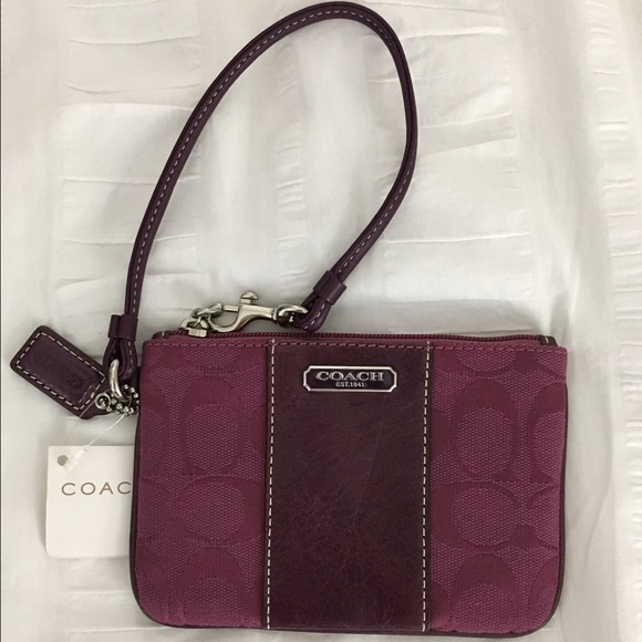 Coach Handbags - Coach signature canvas with leather stripe wrislet