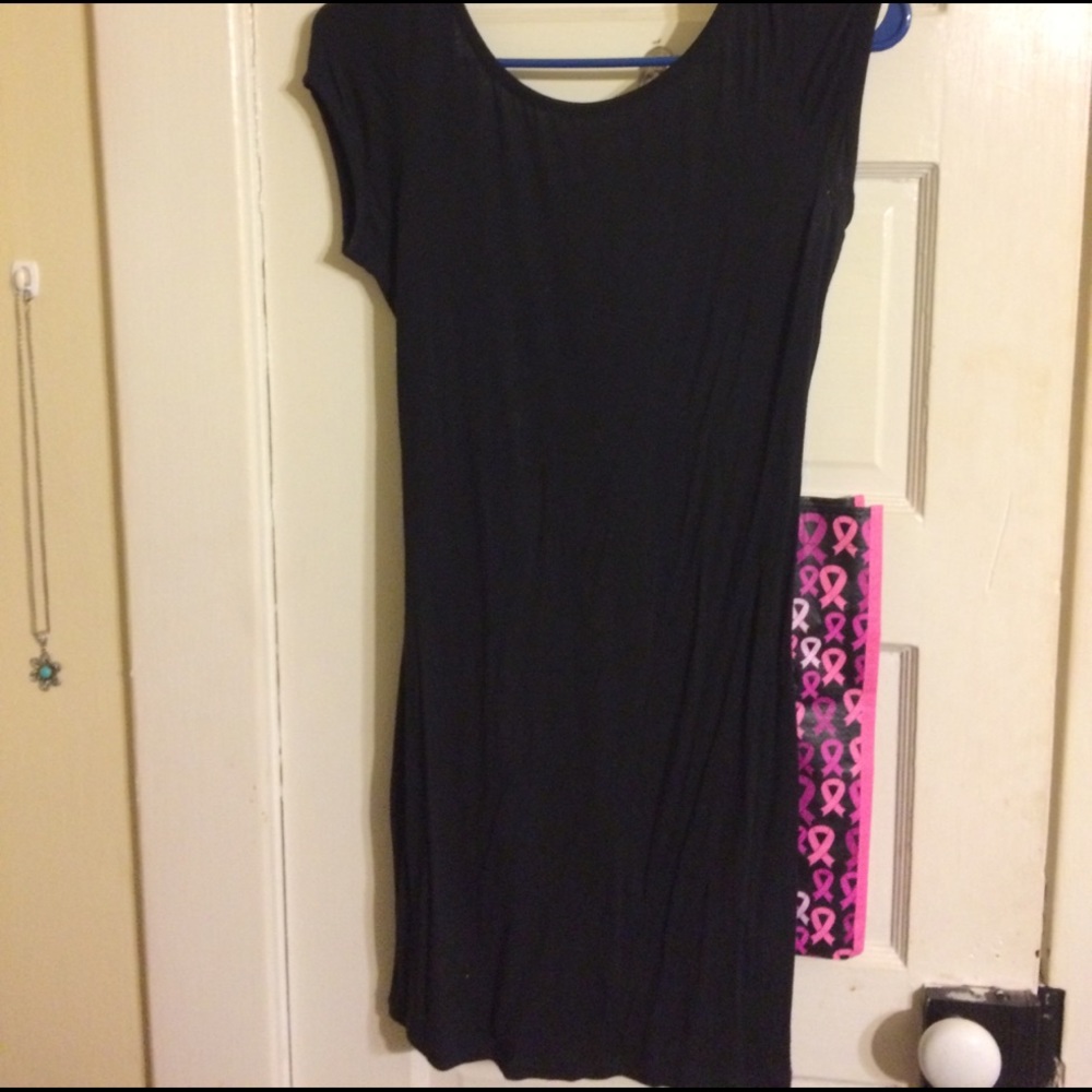 Black little dress with neon straps in the back