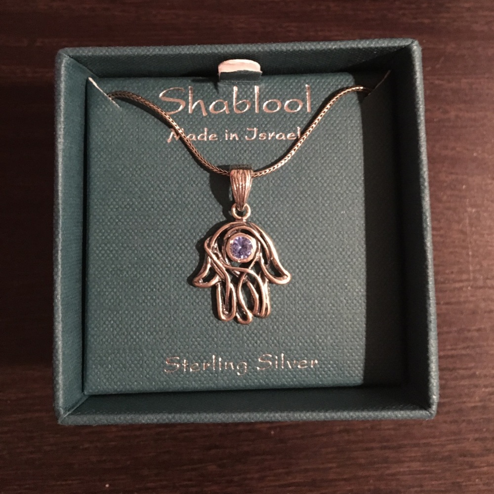 Beautiful hand of God necklace.