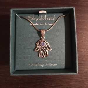 Beautiful hand of God necklace.