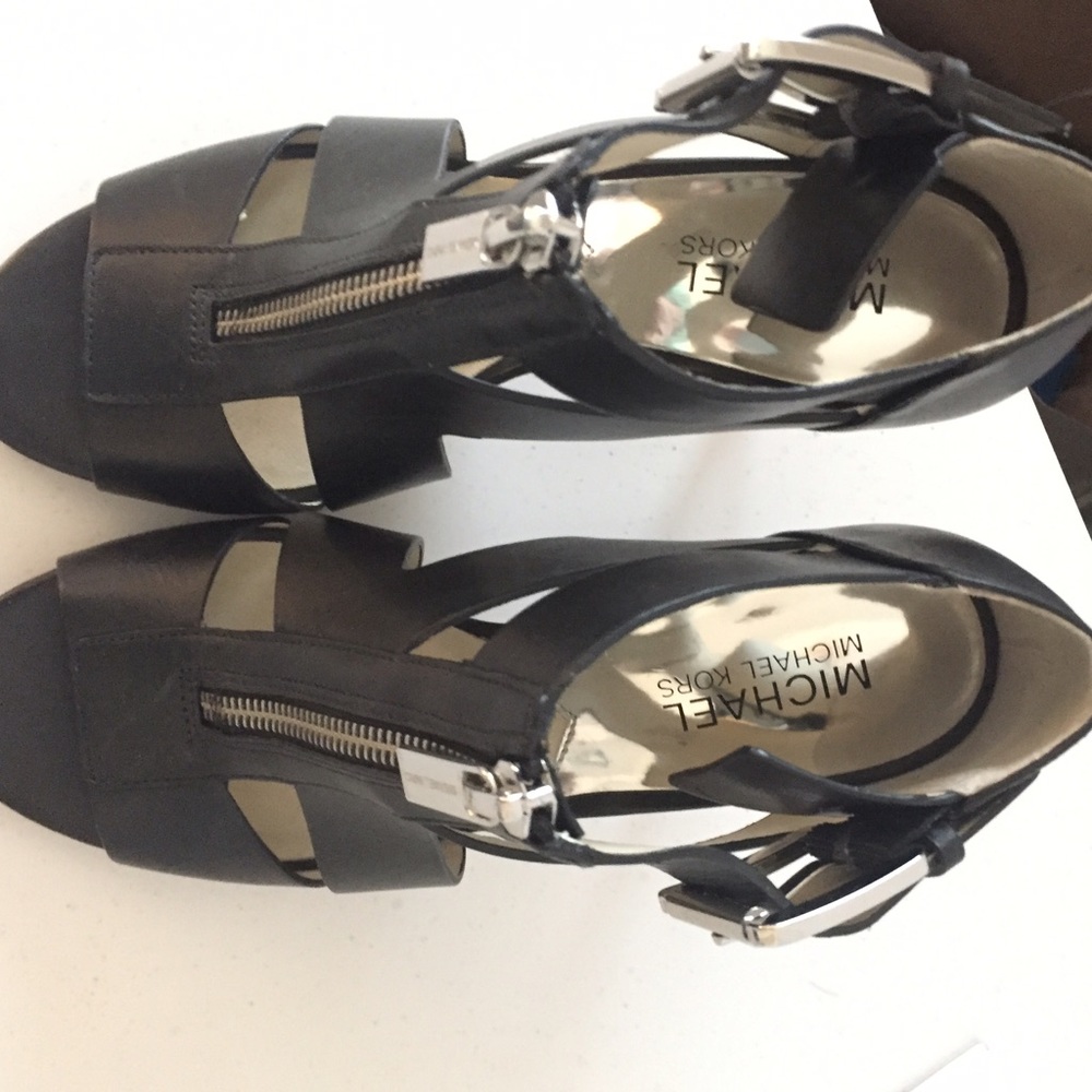 Michael Kors black zip up heels