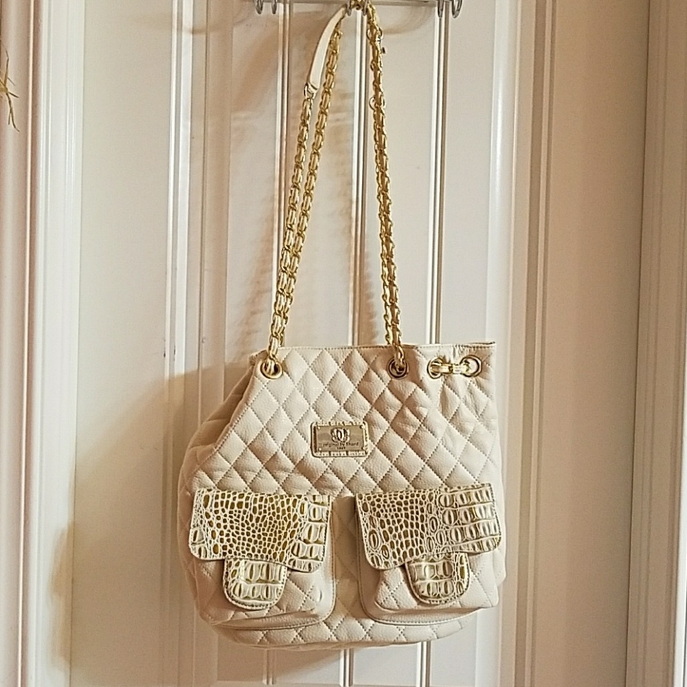 Sharif handbag...coverts to backpack!