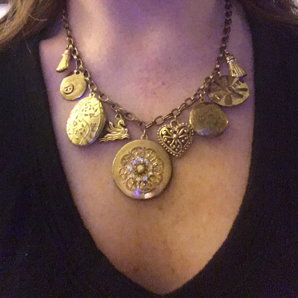 Gold necklace with charms