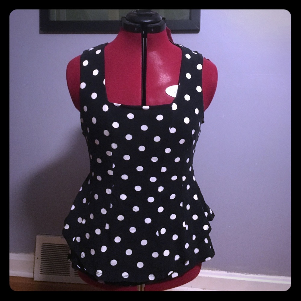 Peplum vintage style polka dot top.
