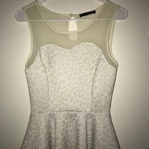White and mesh peplum top