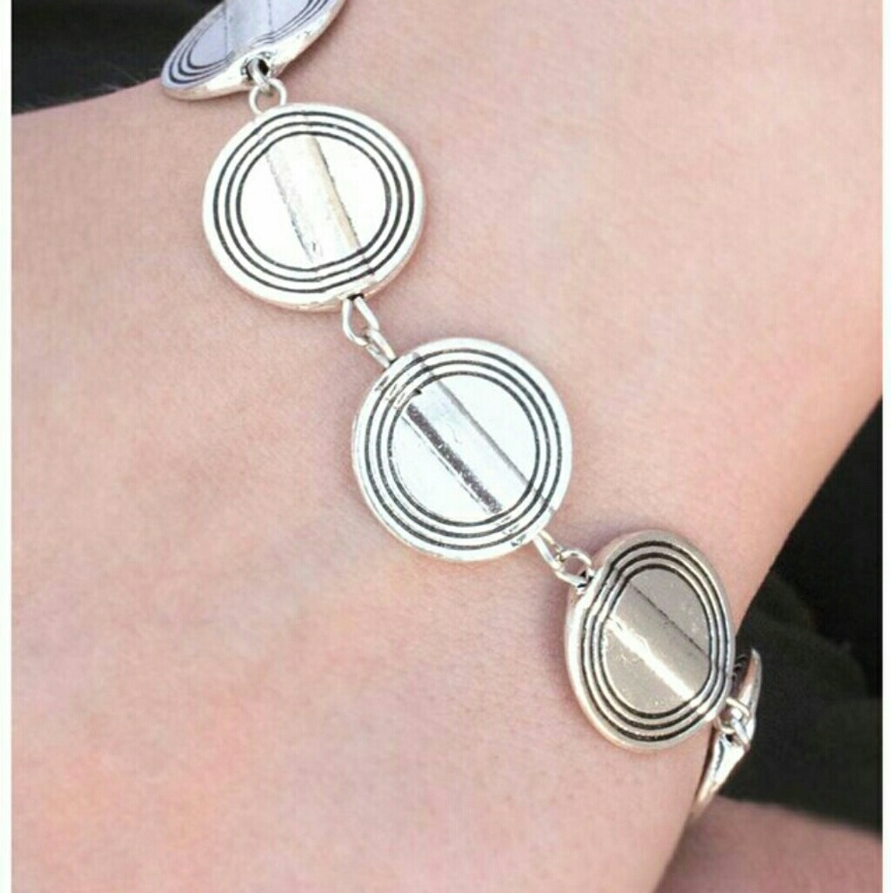 NWT Silver color bracelet rings