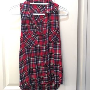 This is a no-sleeve red, plaid button-up top.