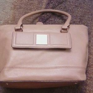 Tan leather purse slightly worn
