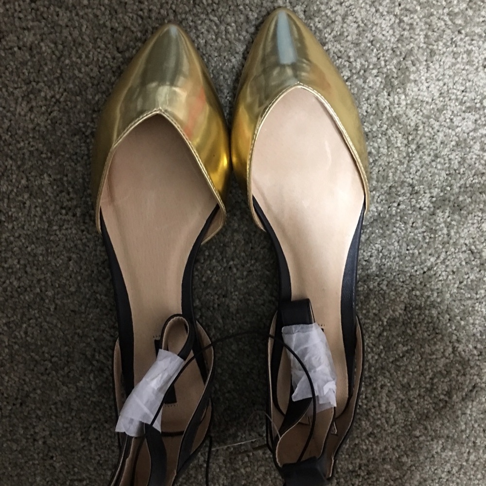 Black and gold sandals