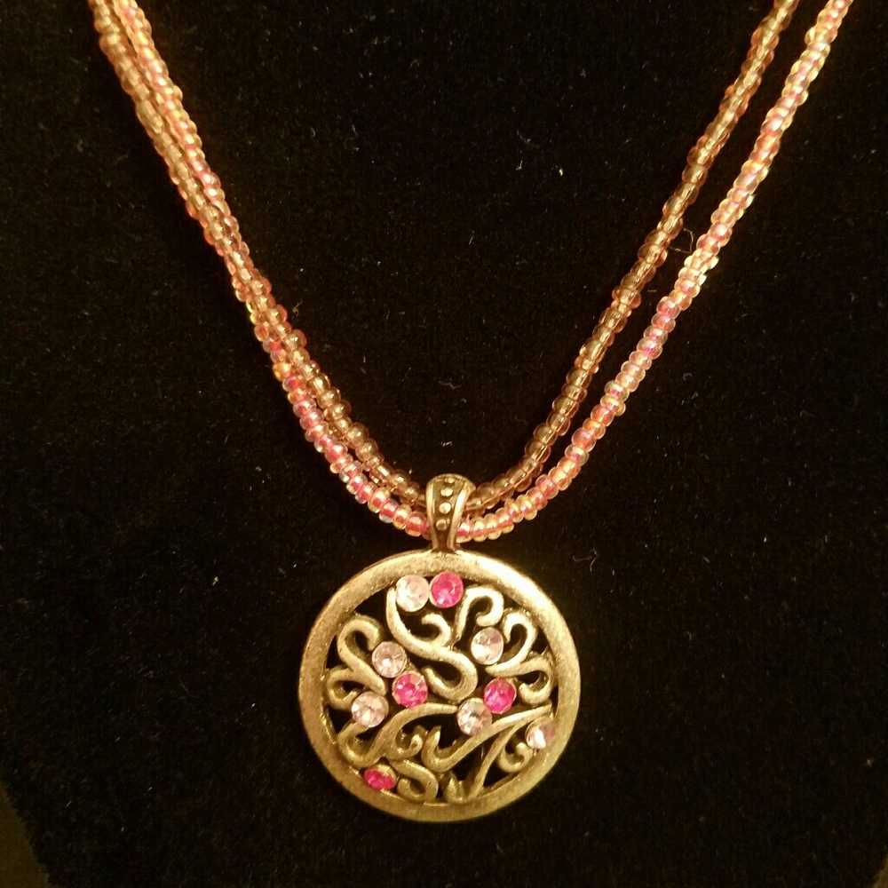 Double stranded necklace with pink accent