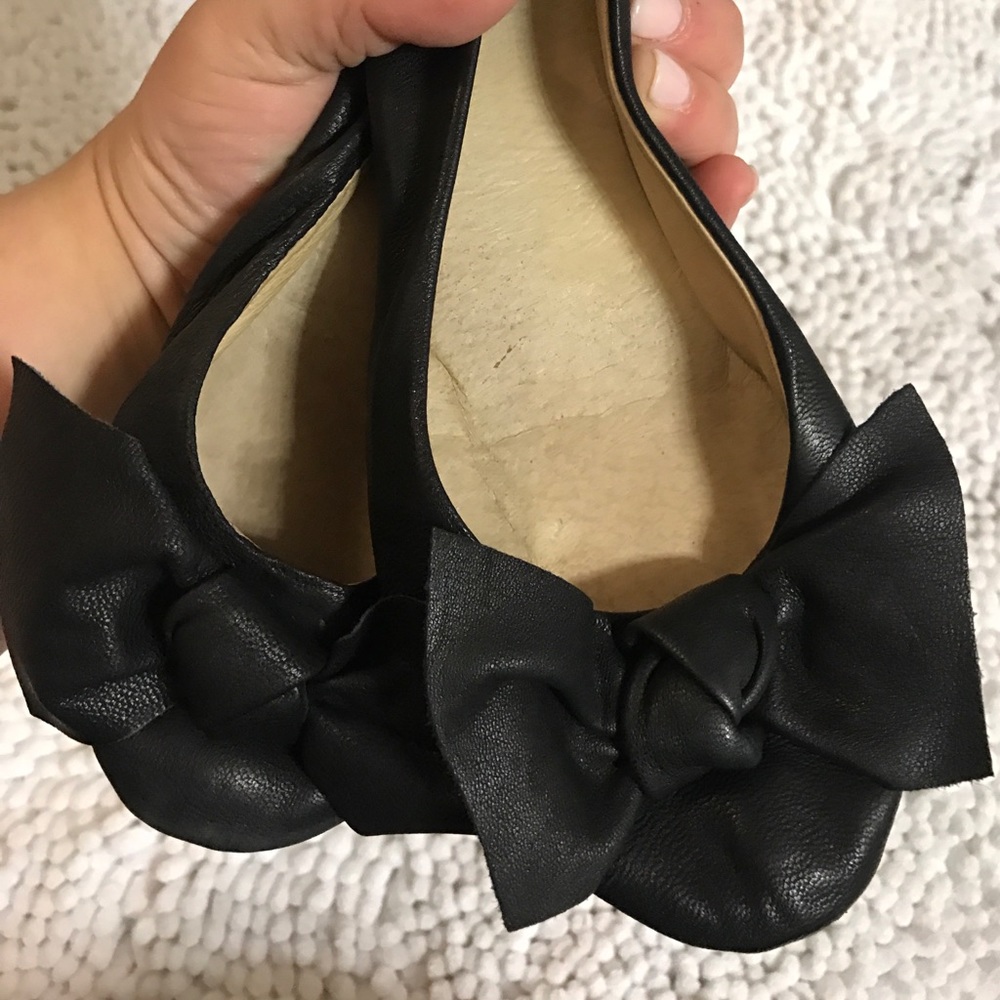 Steve Madden used black bow flats.