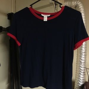 Blue tee with red lining.