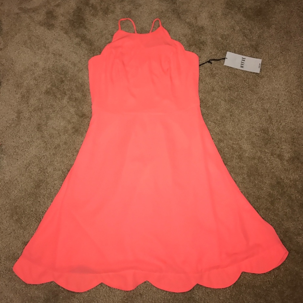Super cute dress with strappy detail in back!