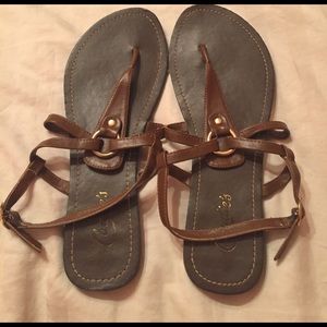 Dark brown leather sandals with adjustable straps