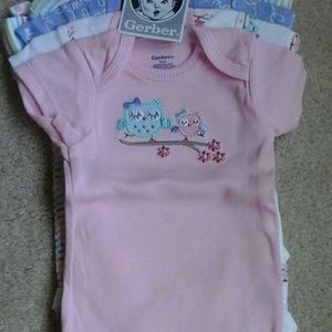 5 short sleeve onesies. 3-6 months NWT!