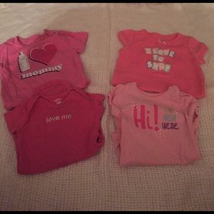 4 pink onesies