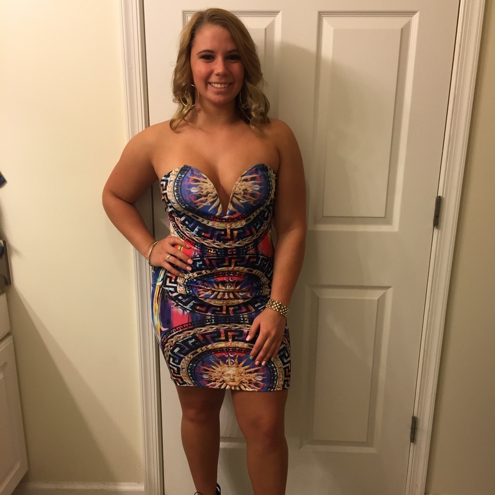 Gently used Olive Olé party dress. Size M