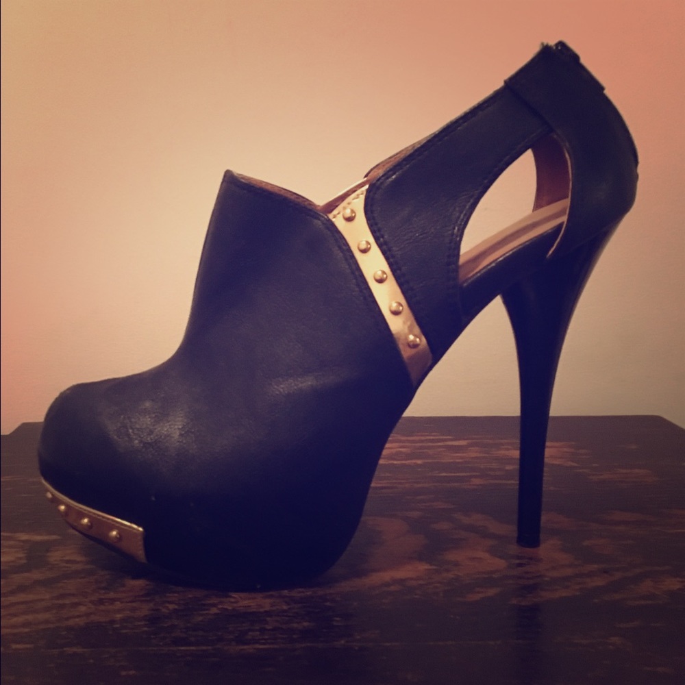 Black and gold heel ankle bootie