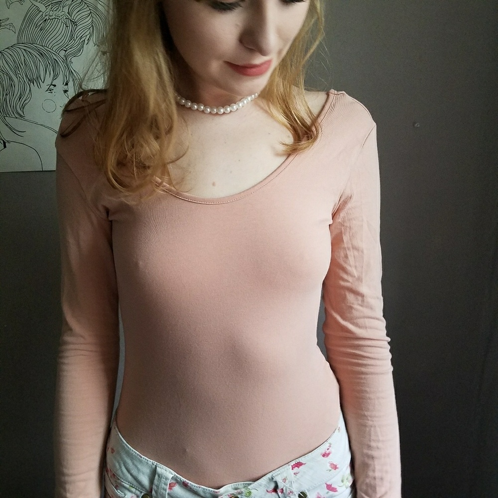 Light pink long sleeve body suit