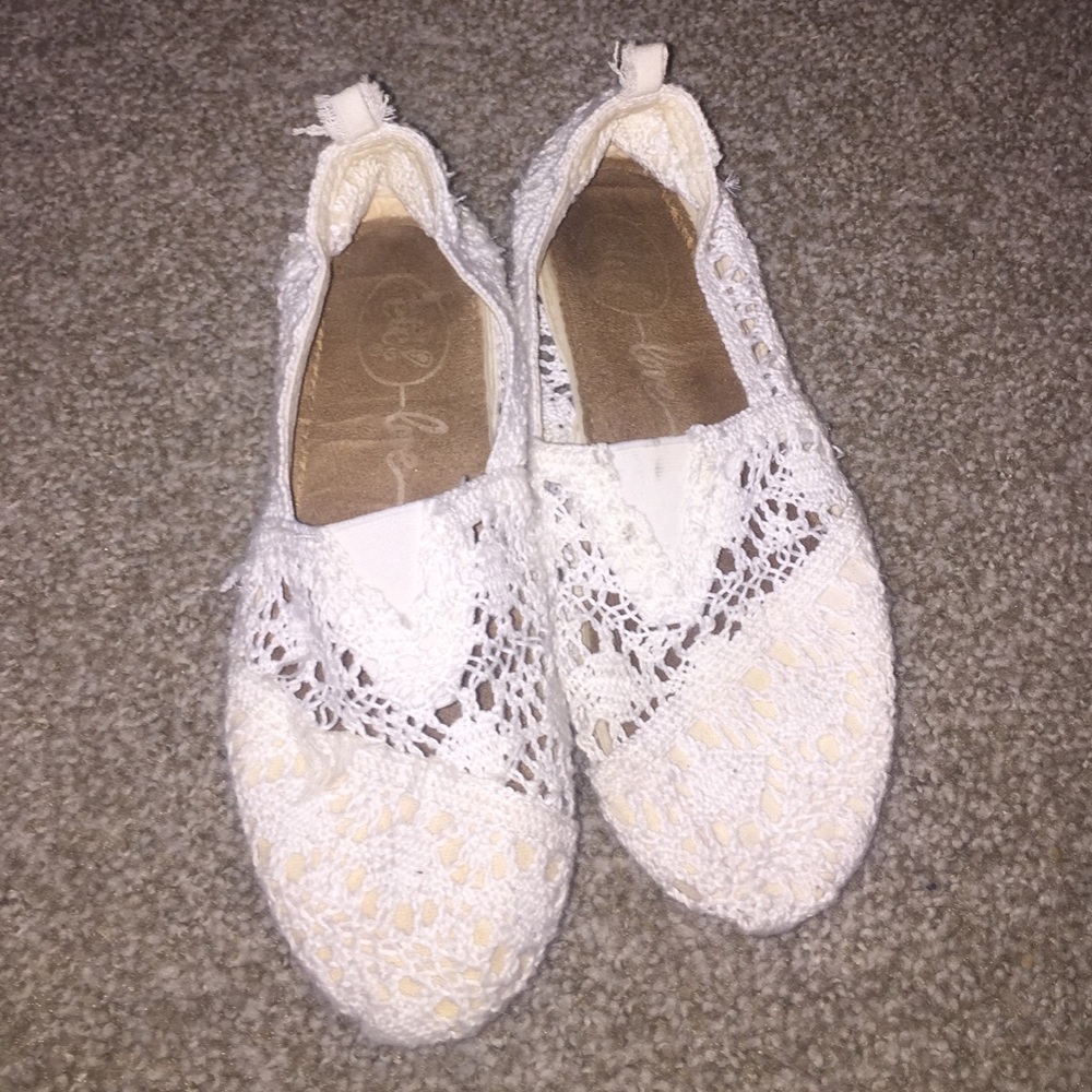 White/cream slip on shoes