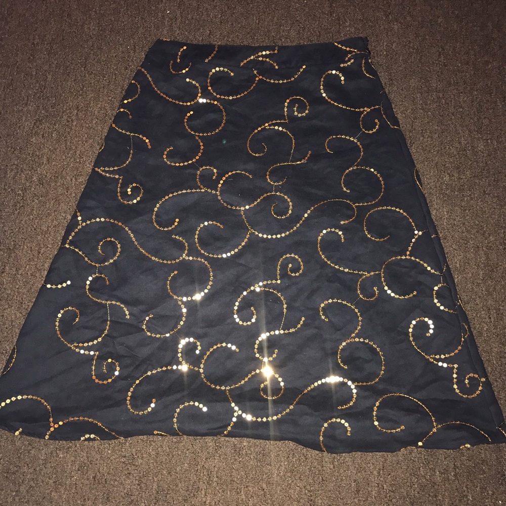 Black velvet skirt with Gold embellishment.