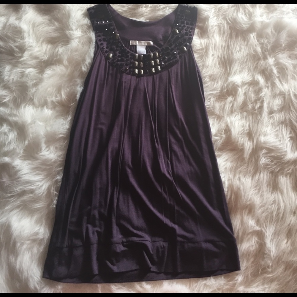 {Design History} plum tank