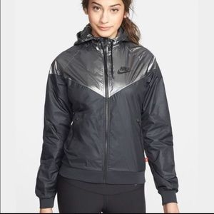 gray metallic and black nike wind breaker