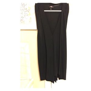 Black V-neck tank top with fringe on the front