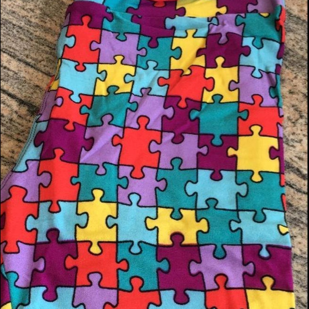 Bnwt lularoe os multi color puzzle piece leggings