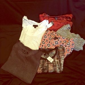 6 tops. Sizes medium and large