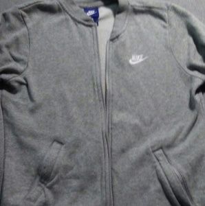 Women's gray Nike zip-up jacket