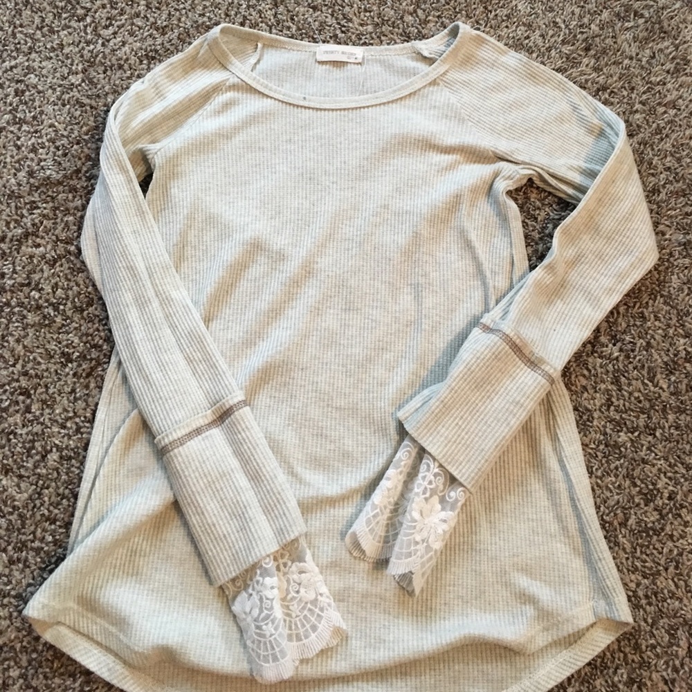 Long sleeve tan shirt with lace sleeve ending