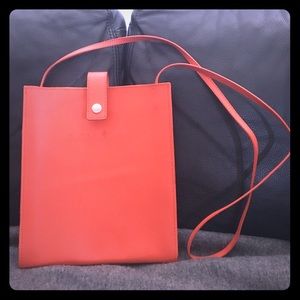 Funky Orange Global Views Crossbody Purse