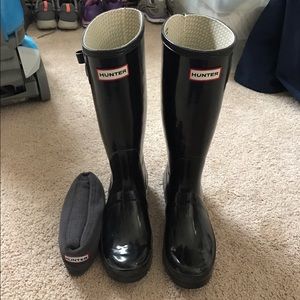 Hunter rain boots.