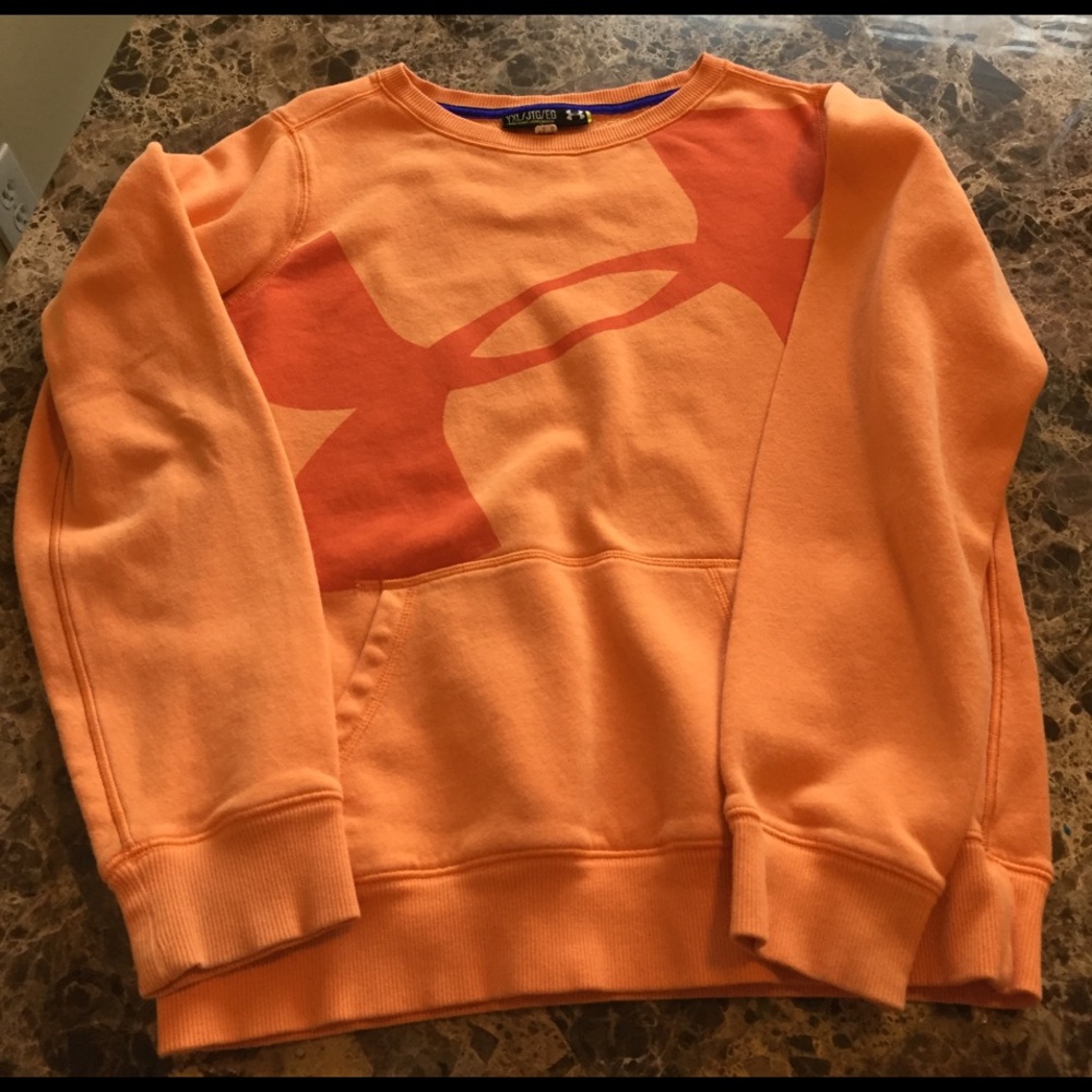 Under Armour sweatshirt, light orange. Good shape.