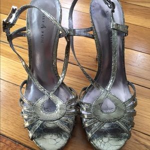 Silver, metallic strapped sandal.