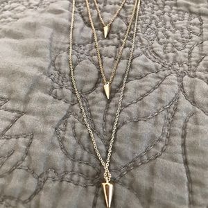Long gold necklace