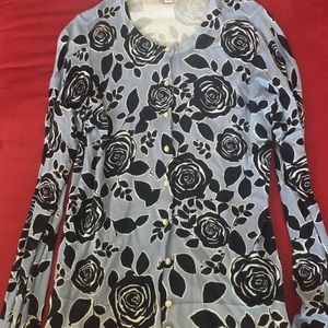Blue button down sweater with black rose pattern