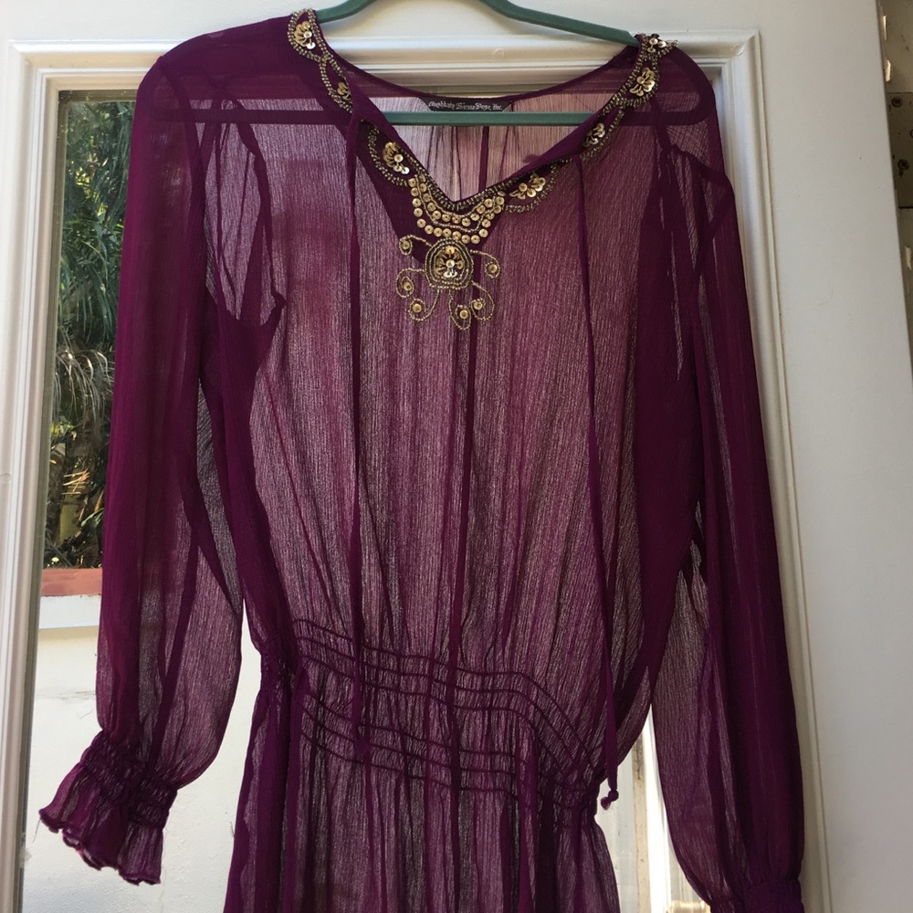 Boho tunic with gold sequin detail.