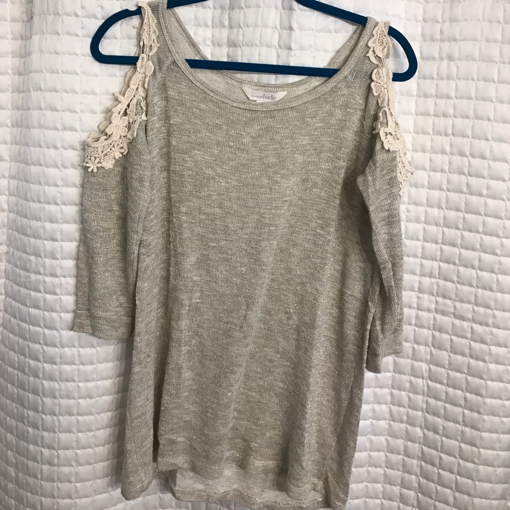 Cold shoulder tunic length sweater