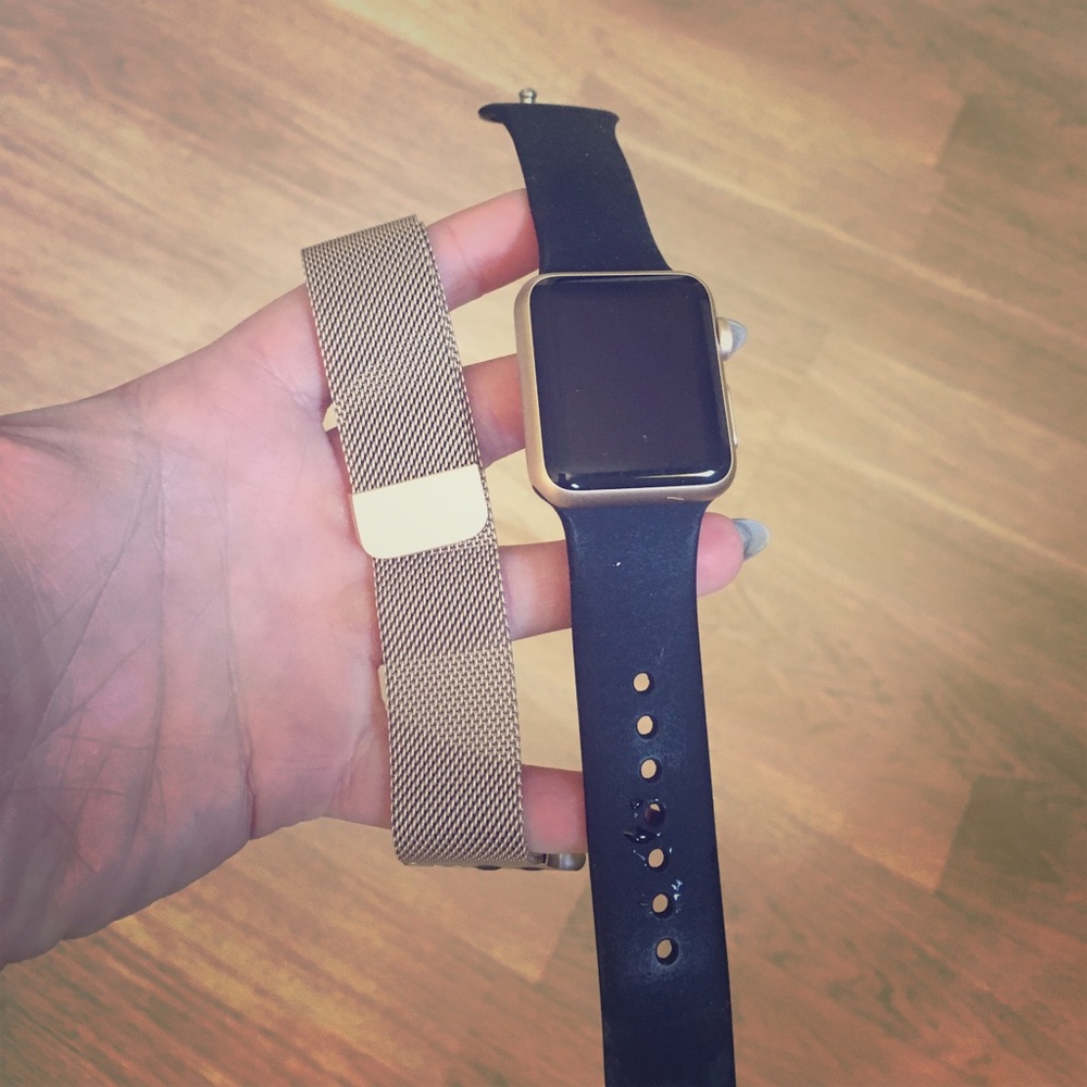 Apple Watch with 3 bands.
