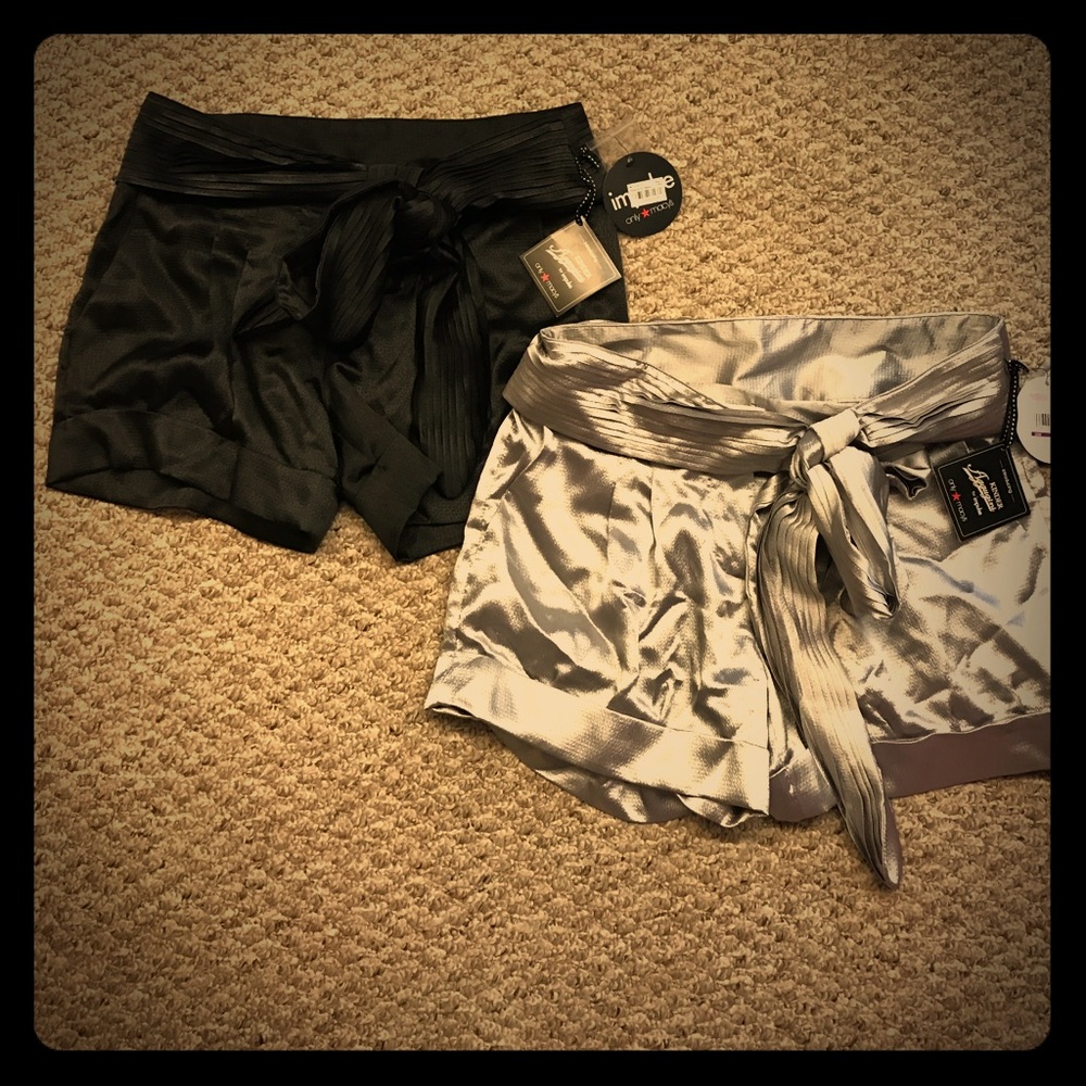 Silver and black silky material shorts