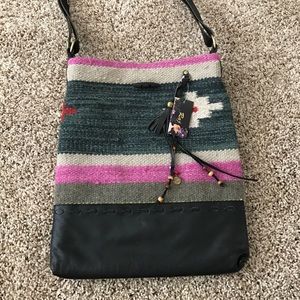 Anthropology Raj carpet leather messenger bag.