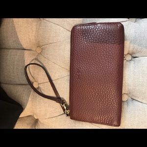 Authentic maroon pebbled leather coach wallet.