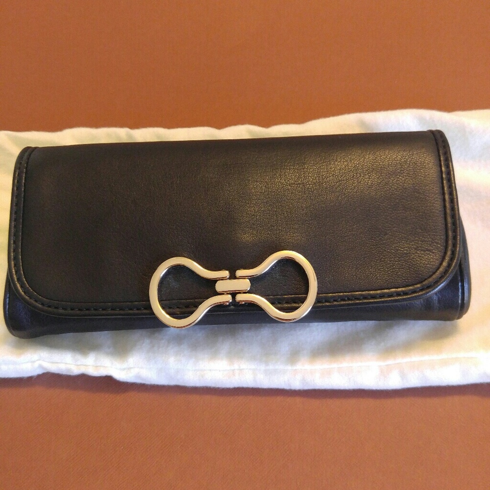 Sold**Cole Haan black clutch