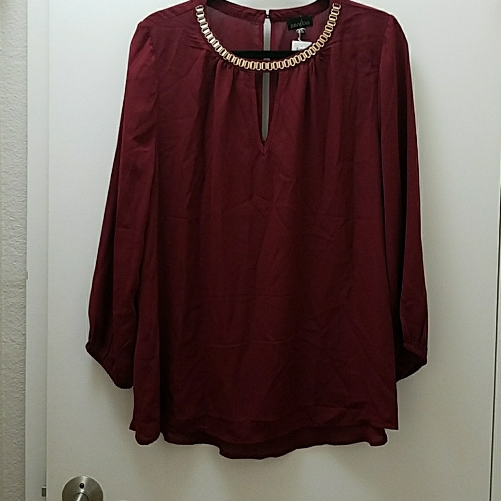 Burgundy blouse with gold necklace detail 2x