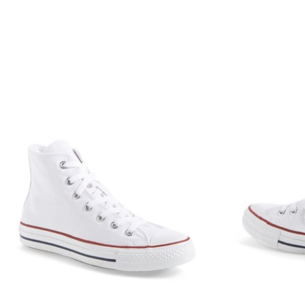 Authentic white height top Chuck Taylor converse