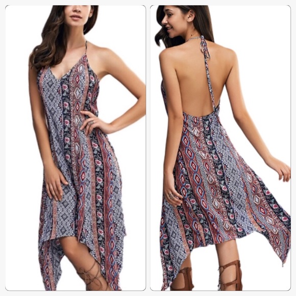 Boutique Dresses & Skirts - HP NWT Pretty Blue  Asymmetrical Halter Dress