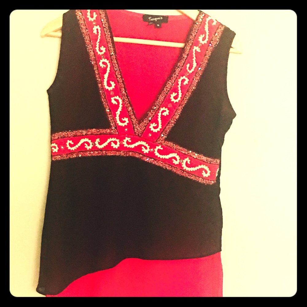 Fuschia pink and black combo top with embroidery.