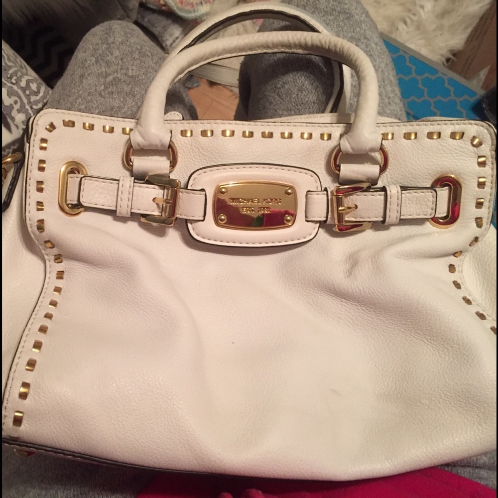 White and gold Michael kors leather tote.